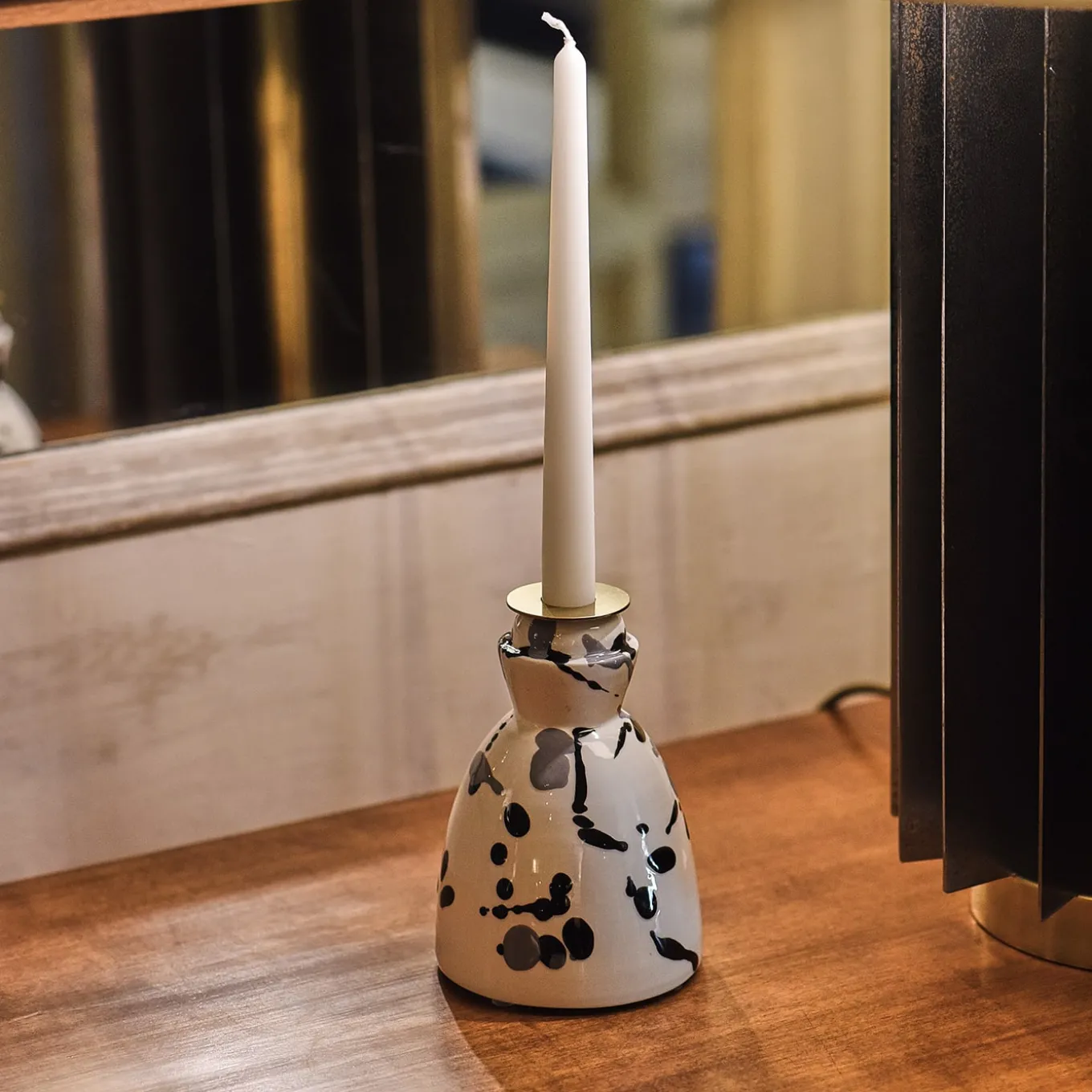 Candeliere in ceramica bianco e nero con 4 candele profumate