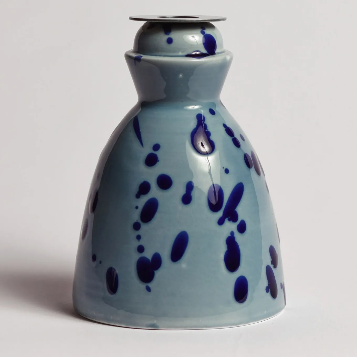 Candeliere in ceramica blu con 4 candele profumate
