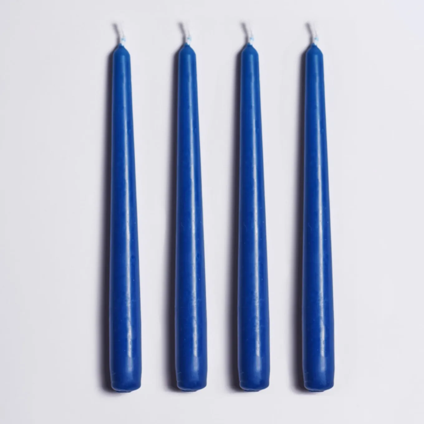 Candeliere in ceramica blu con 4 candele profumate
