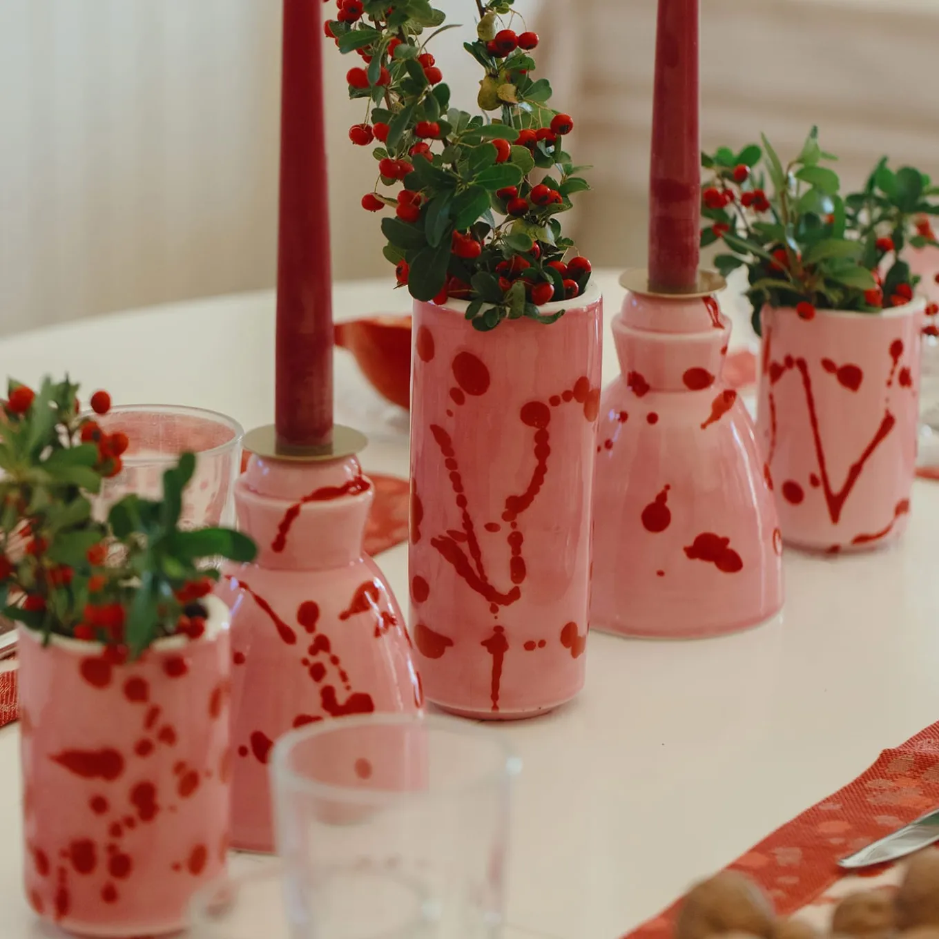 Candeliere in ceramica fucsia con 4 candele profumate