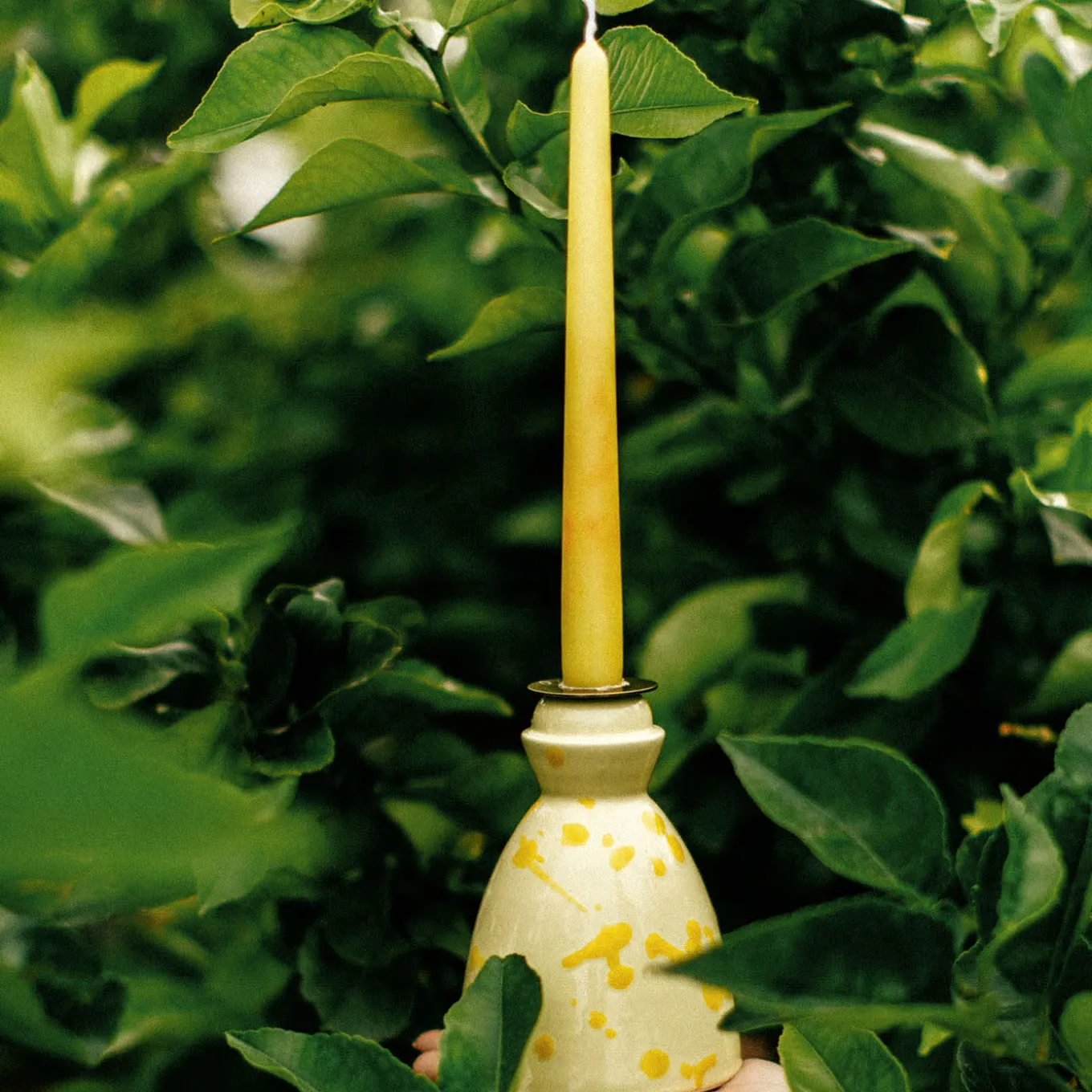 Candeliere in ceramica gialla con 4 candele profumate