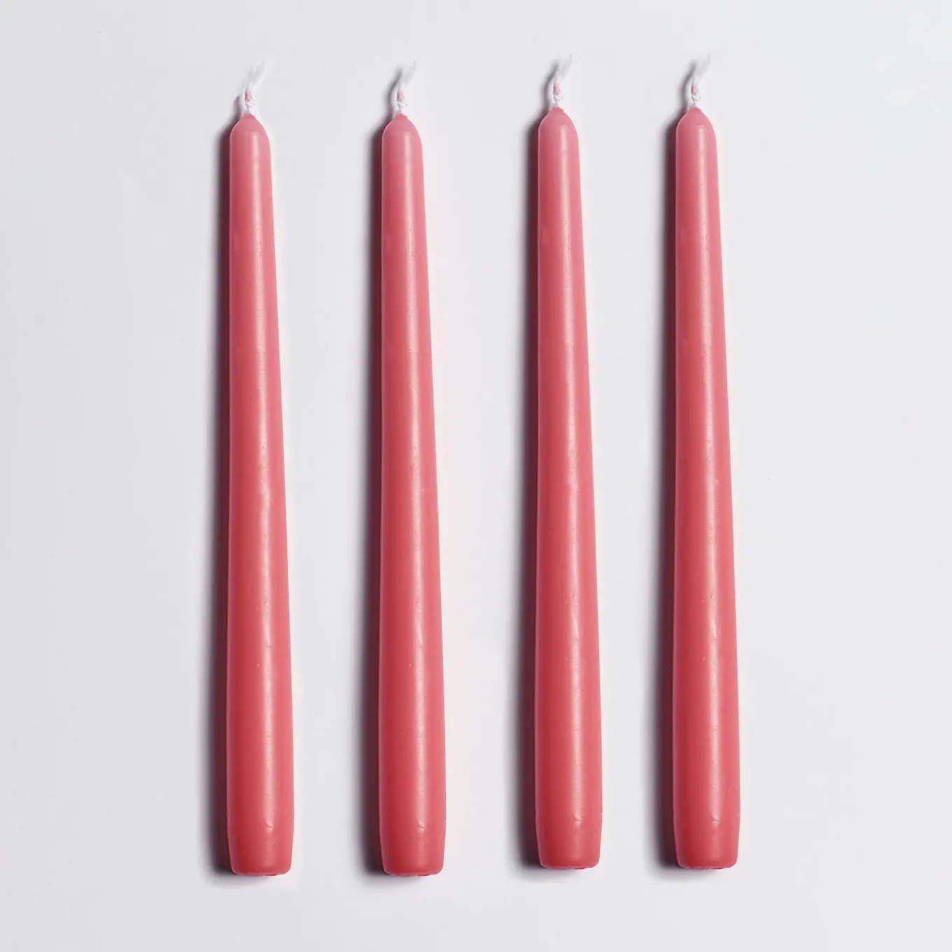Candeliere in ceramica rosa con 4 candele profumate