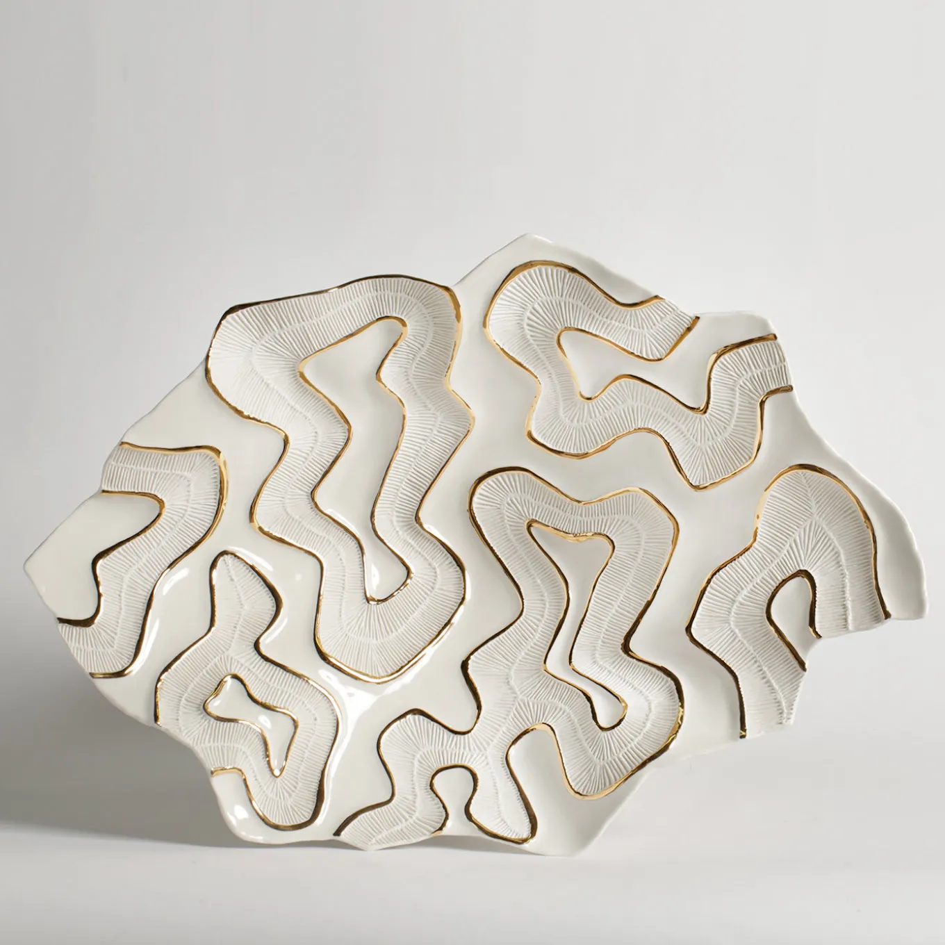 Centrotavola in oro Opensea