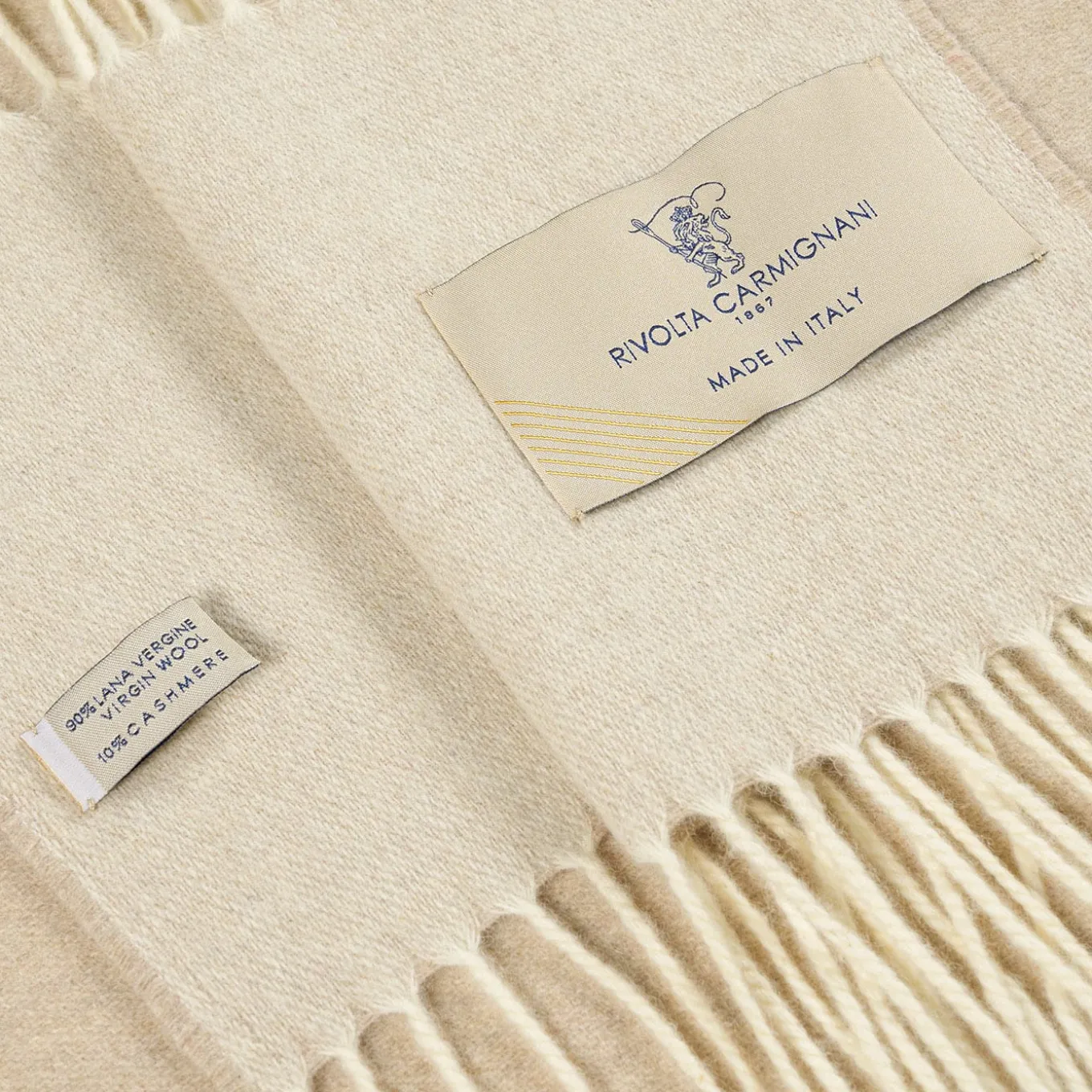 Coperta piccola beige con frange Defilé