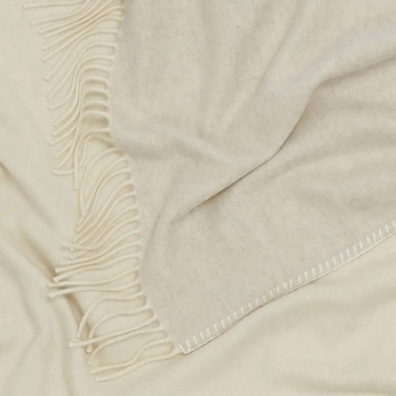Coperta piccola Melrose con frange bianche