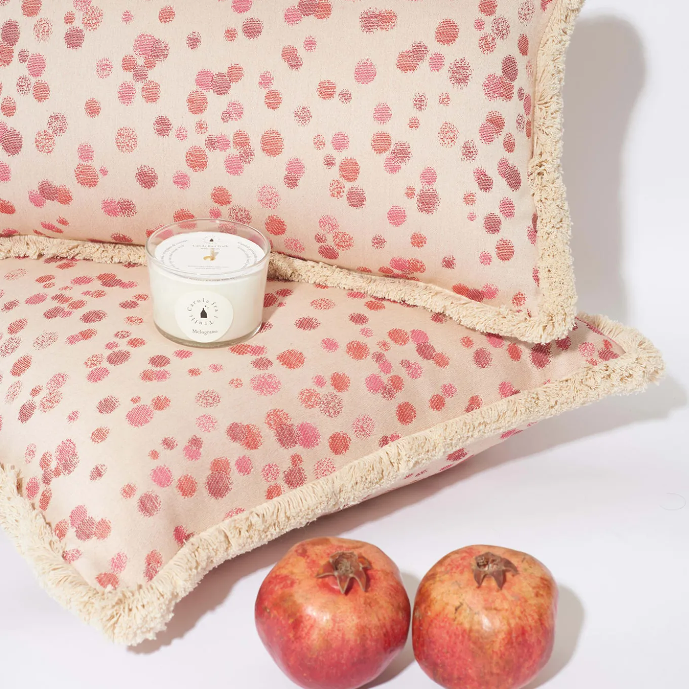 Cuscino piccolo con frange rosse e fucsia