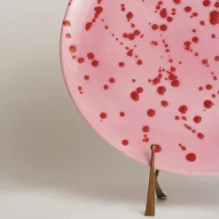 Piatto decorativo in ceramica fucsia e rossa
