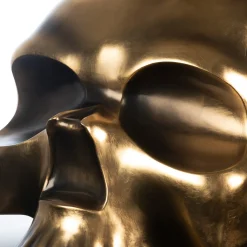 Scultura di teschio d'oro