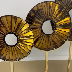 Scultura in vetro ambrato a tre occhi