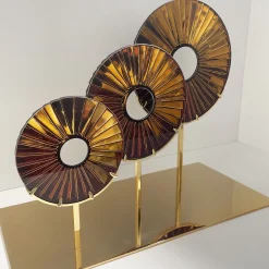 Scultura in vetro ambrato a tre occhi