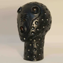 Scultura testa di scimmia nera