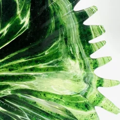 Scultura verde di pesce tropicale