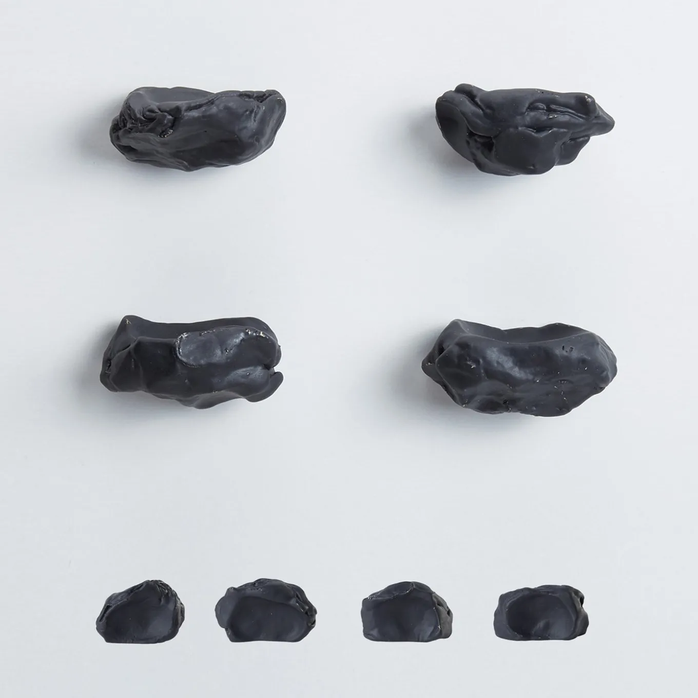 Set di 4 pomelli neri per porte Impronta #3 di Nicole Valenti