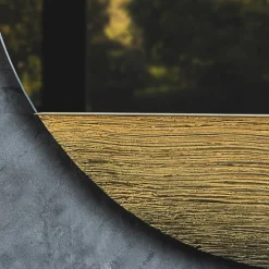 Specchio da parete ovale Orizzonte in resina spatolata oro
