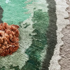 Tappeto rotondo Tactile verde in lana e seta di bambù