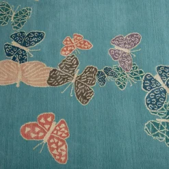 Tappeto Spirit in the Sky Butterfly Blue realizzato a mano in lana e seta
