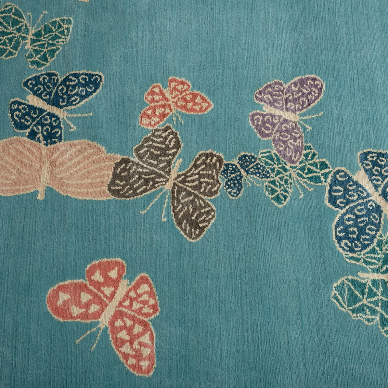 Tappeto Spirit in the Sky Butterfly Blue realizzato a mano in lana e seta