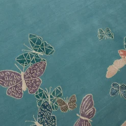 Tappeto Spirit in the Sky Butterfly Blue realizzato a mano in lana e seta