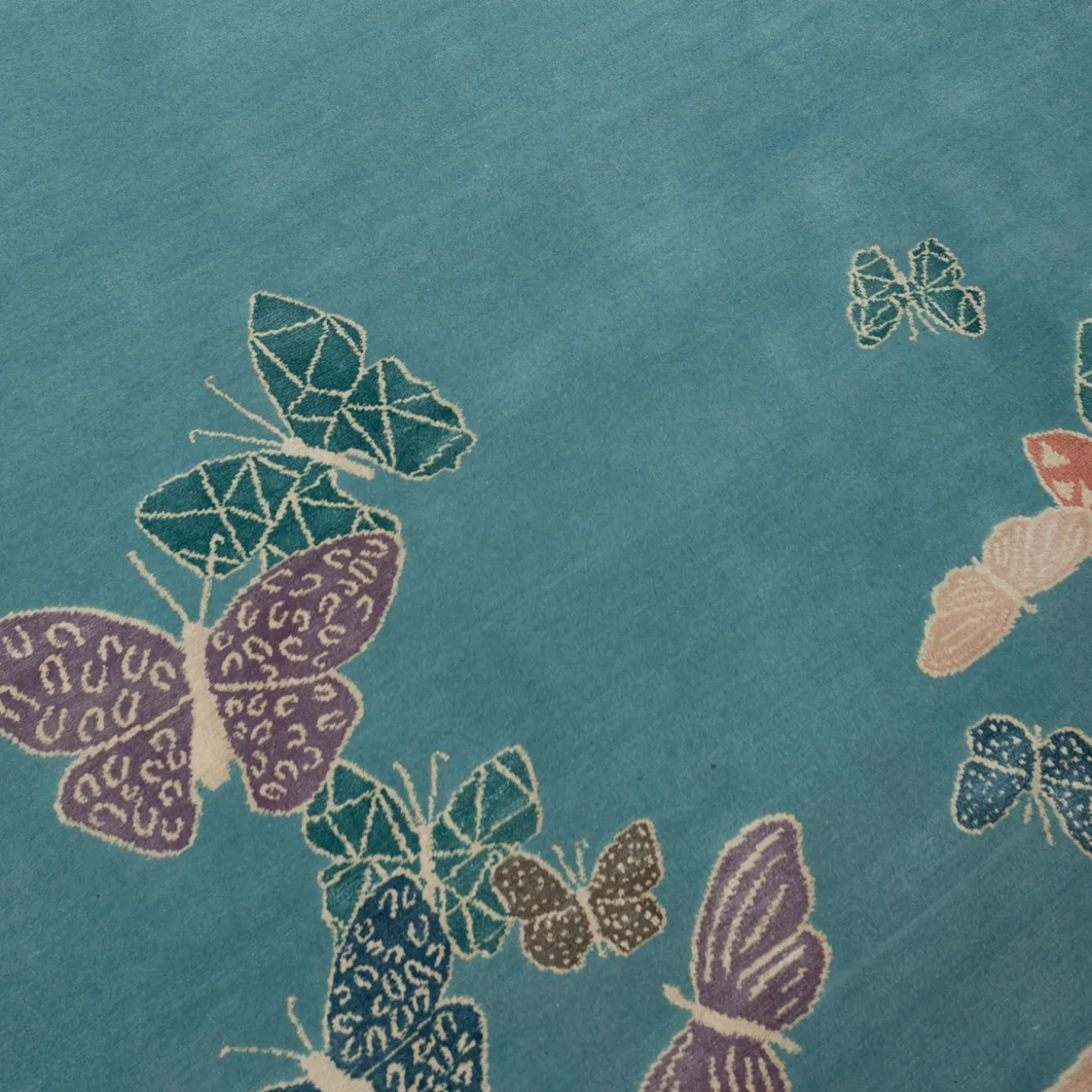Tappeto Spirit in the Sky Butterfly Blue realizzato a mano in lana e seta