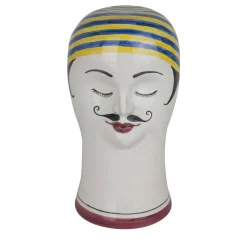 Testa di nuotatore con cappuccio giallo e blu Scultura
